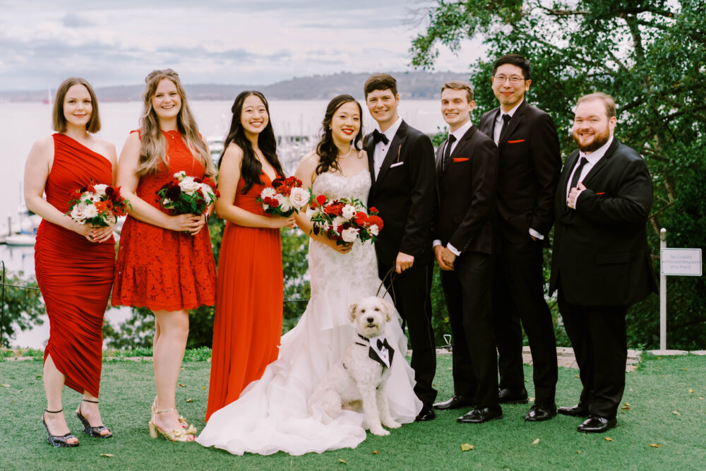 Bridesmaids carried red and white bouquets 