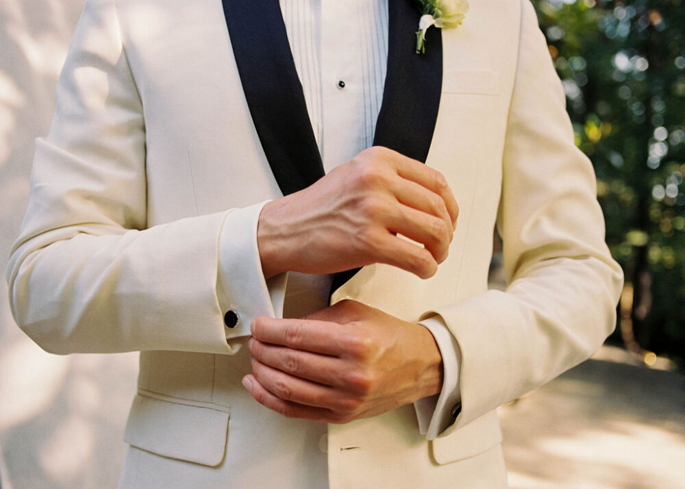 Grooms white boutonniere 