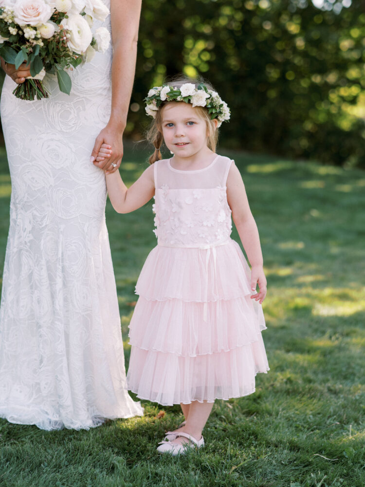 Bride and flower girl wearing flower halo
